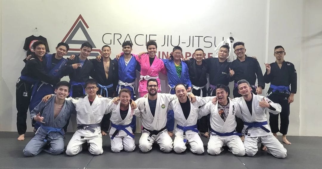 Women learning practical self-defence concepts through Jiu-Jitsu training