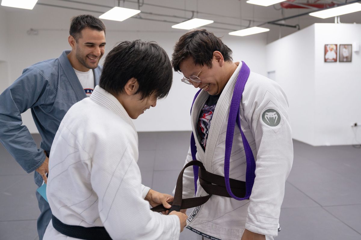 A belt promotion at GJJ Singapore. Every stage of progress is built one class at a time.